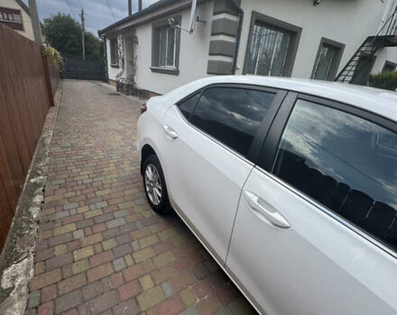Білий Тойота Королла, об'ємом двигуна 1.6 л та пробігом 117 тис. км за 14000 $, фото 16 на Automoto.ua