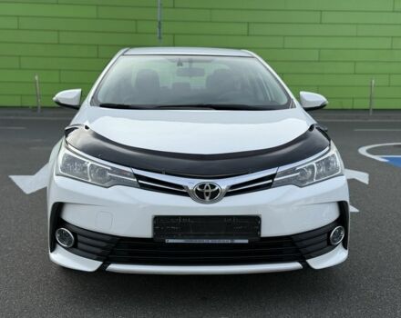 Белый Тойота Королла, объемом двигателя 1.6 л и пробегом 169 тыс. км за 9900 $, фото 1 на Automoto.ua