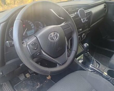 Білий Тойота Королла, об'ємом двигуна 1.6 л та пробігом 203 тис. км за 10000 $, фото 10 на Automoto.ua