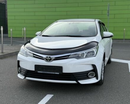 Белый Тойота Королла, объемом двигателя 1.6 л и пробегом 169 тыс. км за 9900 $, фото 2 на Automoto.ua