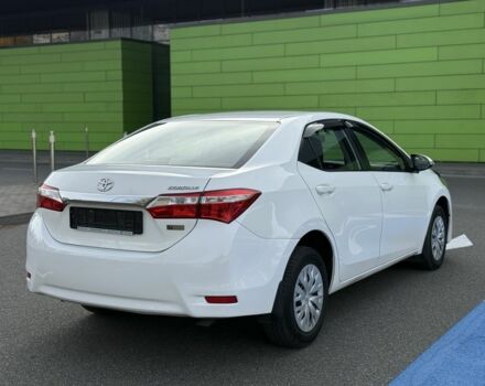 Белый Тойота Королла, объемом двигателя 1.6 л и пробегом 169 тыс. км за 9900 $, фото 5 на Automoto.ua