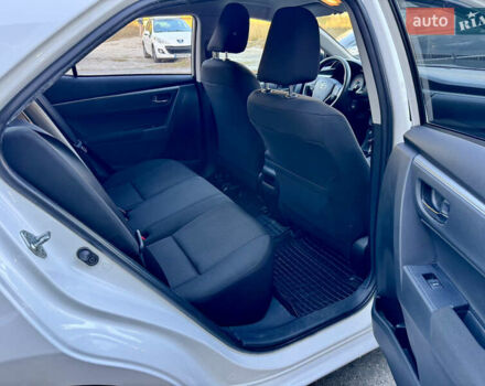 Белый Тойота Королла, объемом двигателя 1.6 л и пробегом 147 тыс. км за 13200 $, фото 7 на Automoto.ua