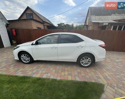 Білий Тойота Королла, об'ємом двигуна 1.6 л та пробігом 117 тис. км за 14000 $, фото 9 на Automoto.ua