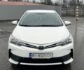 Белый Тойота Королла, объемом двигателя 1.3 л и пробегом 67 тыс. км за 11850 $, фото 6 на Automoto.ua