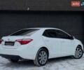 Белый Тойота Королла, объемом двигателя 1.8 л и пробегом 145 тыс. км за 10799 $, фото 7 на Automoto.ua