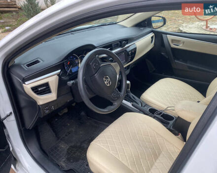 Белый Тойота Королла, объемом двигателя 1.8 л и пробегом 47 тыс. км за 10999 $, фото 24 на Automoto.ua