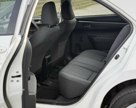 Белый Тойота Королла, объемом двигателя 1.6 л и пробегом 169 тыс. км за 9900 $, фото 11 на Automoto.ua