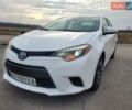 Білий Тойота Королла, об'ємом двигуна 1.8 л та пробігом 185 тис. км за 11350 $, фото 4 на Automoto.ua