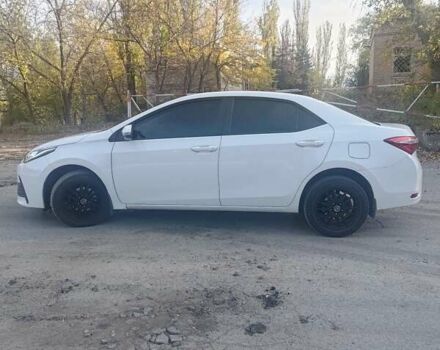 Білий Тойота Королла, об'ємом двигуна 1.6 л та пробігом 203 тис. км за 10000 $, фото 17 на Automoto.ua