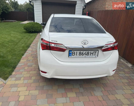 Білий Тойота Королла, об'ємом двигуна 1.6 л та пробігом 117 тис. км за 14000 $, фото 1 на Automoto.ua