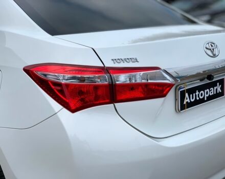 Белый Тойота Королла, объемом двигателя 1.3 л и пробегом 150 тыс. км за 12390 $, фото 33 на Automoto.ua