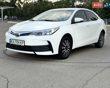 Білий Тойота Королла, об'ємом двигуна 1.6 л та пробігом 170 тис. км за 14000 $, фото 1 на Automoto.ua