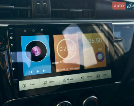 Белый Тойота Королла, объемом двигателя 1.6 л и пробегом 155 тыс. км за 12900 $, фото 12 на Automoto.ua