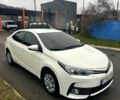 Білий Тойота Королла, об'ємом двигуна 1.6 л та пробігом 205 тис. км за 13700 $, фото 1 на Automoto.ua