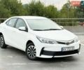 Білий Тойота Королла, об'ємом двигуна 1.6 л та пробігом 183 тис. км за 10700 $, фото 1 на Automoto.ua