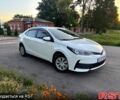 Білий Тойота Королла, об'ємом двигуна 1.3 л та пробігом 191 тис. км за 10300 $, фото 1 на Automoto.ua