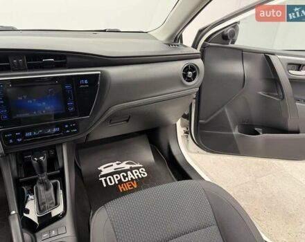 Белый Тойота Королла, объемом двигателя 1.6 л и пробегом 45 тыс. км за 16700 $, фото 38 на Automoto.ua