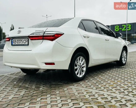 Білий Тойота Королла, об'ємом двигуна 1.6 л та пробігом 72 тис. км за 13700 $, фото 7 на Automoto.ua