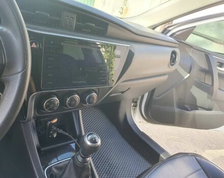 Белый Тойота Королла, объемом двигателя 1.3 л и пробегом 190 тыс. км за 12500 $, фото 18 на Automoto.ua
