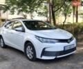 Білий Тойота Королла, об'ємом двигуна 1.33 л та пробігом 130 тис. км за 10800 $, фото 1 на Automoto.ua