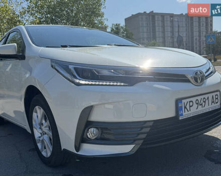 Білий Тойота Королла, об'ємом двигуна 1.6 л та пробігом 23 тис. км за 17499 $, фото 2 на Automoto.ua