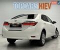 Белый Тойота Королла, объемом двигателя 1.6 л и пробегом 45 тыс. км за 15700 $, фото 6 на Automoto.ua