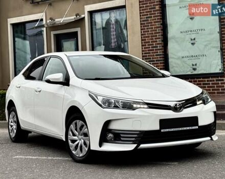 Білий Тойота Королла, об'ємом двигуна 1.6 л та пробігом 45 тис. км за 18000 $, фото 1 на Automoto.ua