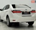 Белый Тойота Королла, объемом двигателя 1.6 л и пробегом 45 тыс. км за 16700 $, фото 8 на Automoto.ua