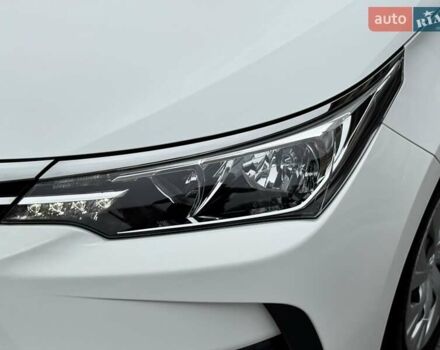 Білий Тойота Королла, об'ємом двигуна 1.6 л та пробігом 45 тис. км за 18000 $, фото 17 на Automoto.ua