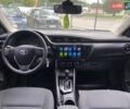 Білий Тойота Королла, об'ємом двигуна 1.6 л та пробігом 155 тис. км за 13250 $, фото 14 на Automoto.ua
