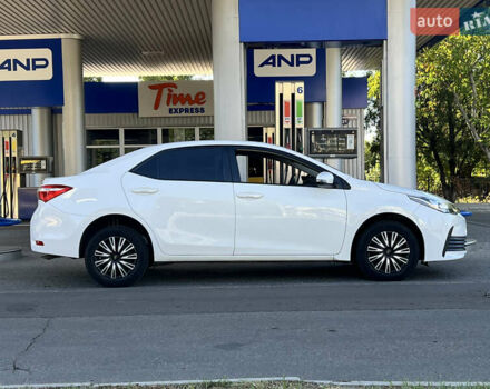 Белый Тойота Королла, объемом двигателя 1.6 л и пробегом 176 тыс. км за 13999 $, фото 3 на Automoto.ua