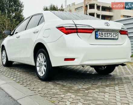 Білий Тойота Королла, об'ємом двигуна 1.6 л та пробігом 72 тис. км за 13700 $, фото 6 на Automoto.ua