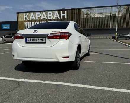 Білий Тойота Королла, об'ємом двигуна 1.6 л та пробігом 258 тис. км за 13500 $, фото 5 на Automoto.ua