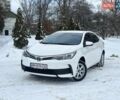 Білий Тойота Королла, об'ємом двигуна 1.33 л та пробігом 147 тис. км за 9850 $, фото 1 на Automoto.ua