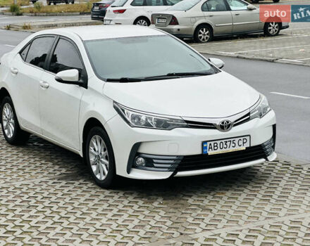 Білий Тойота Королла, об'ємом двигуна 1.6 л та пробігом 72 тис. км за 13700 $, фото 1 на Automoto.ua