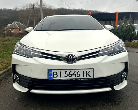 Білий Тойота Королла, об'ємом двигуна 1.6 л та пробігом 205 тис. км за 13700 $, фото 1 на Automoto.ua