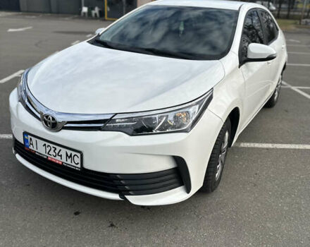 Белый Тойота Королла, объемом двигателя 1.6 л и пробегом 143 тыс. км за 13500 $, фото 1 на Automoto.ua