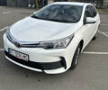 Белый Тойота Королла, объемом двигателя 1.6 л и пробегом 143 тыс. км за 13500 $, фото 1 на Automoto.ua