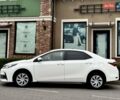 Білий Тойота Королла, об'ємом двигуна 1.6 л та пробігом 45 тис. км за 18000 $, фото 8 на Automoto.ua