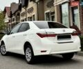 Білий Тойота Королла, об'ємом двигуна 1.6 л та пробігом 45 тис. км за 18000 $, фото 9 на Automoto.ua