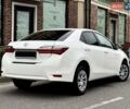 Білий Тойота Королла, об'ємом двигуна 1.6 л та пробігом 45 тис. км за 18000 $, фото 14 на Automoto.ua