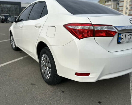 Белый Тойота Королла, объемом двигателя 1.6 л и пробегом 143 тыс. км за 13500 $, фото 4 на Automoto.ua