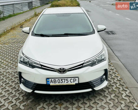 Білий Тойота Королла, об'ємом двигуна 1.6 л та пробігом 72 тис. км за 13700 $, фото 2 на Automoto.ua