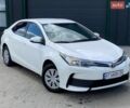 Белый Тойота Королла, объемом двигателя 1.3 л и пробегом 150 тыс. км за 9400 $, фото 1 на Automoto.ua