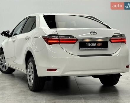 Белый Тойота Королла, объемом двигателя 1.6 л и пробегом 45 тыс. км за 15700 $, фото 7 на Automoto.ua