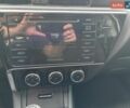 Білий Тойота Королла, об'ємом двигуна 1.33 л та пробігом 191 тис. км за 10600 $, фото 16 на Automoto.ua