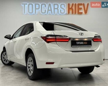 Белый Тойота Королла, объемом двигателя 1.6 л и пробегом 45 тыс. км за 16700 $, фото 9 на Automoto.ua