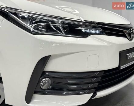 Белый Тойота Королла, объемом двигателя 1.6 л и пробегом 45 тыс. км за 15700 $, фото 16 на Automoto.ua