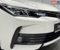Белый Тойота Королла, объемом двигателя 1.6 л и пробегом 45 тыс. км за 15700 $, фото 16 на Automoto.ua