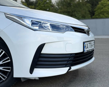 Білий Тойота Королла, об'ємом двигуна 1.6 л та пробігом 170 тис. км за 14000 $, фото 11 на Automoto.ua